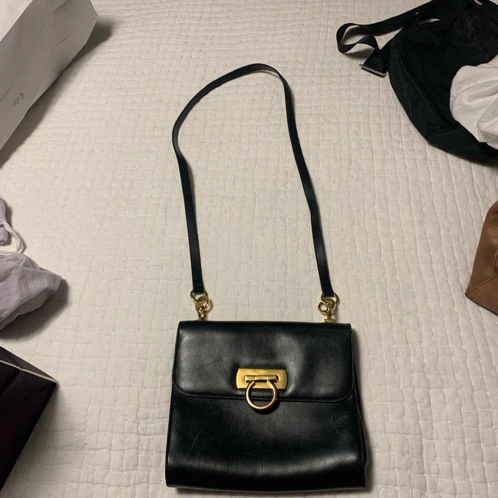 Black Ferragamo crossbody with gold hardware